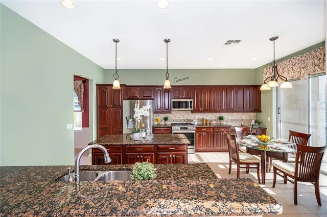 a living room with lots of furniture and appliances