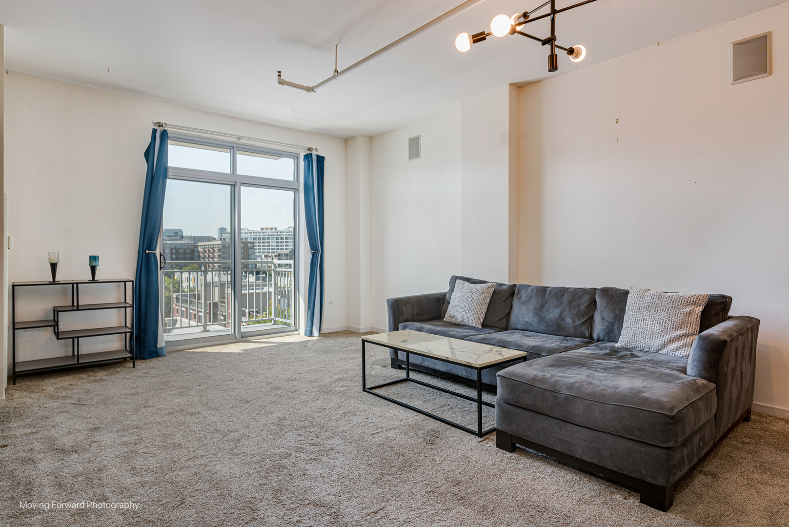 511 West Division Street, Unit 609 Chicago, IL 60610 - Photo 11 of 21 a living room with furniture and a flat screen tv