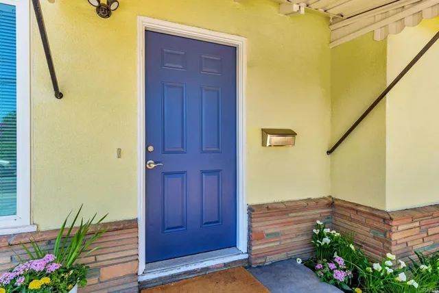 a view of entryway with flower pots