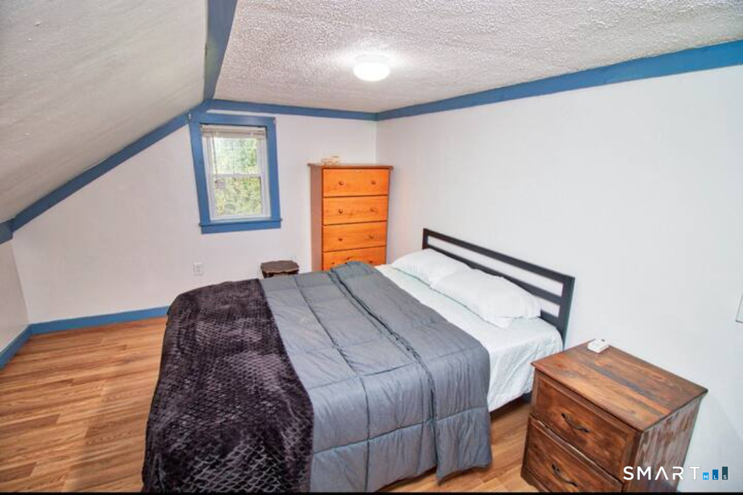 15 Lower Road North Canaan, CT 06018 - Photo 34 of 36 a bedroom with a bed and a window