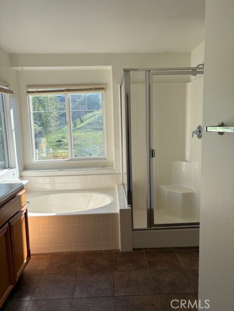 5824 Oak Fern Court Simi Valley, CA 93063 - Photo 13 of 31 a bathroom with a bathtub and a shower