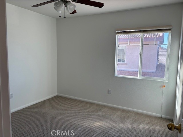 5824 Oak Fern Court Simi Valley, CA 93063 - Photo 19 of 31 a view of a small space with wooden floor and a window