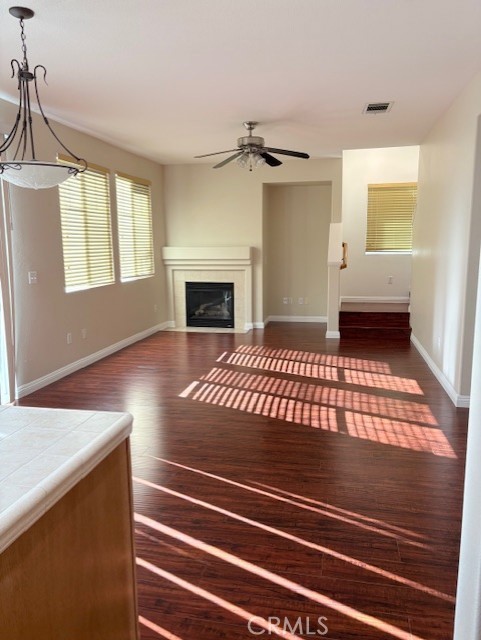 5824 Oak Fern Court Simi Valley, CA 93063 - Photo 7 of 31 a view of an empty room with a fireplace and a window