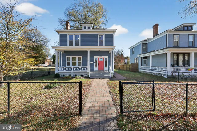 a front view of a house with swimming pool