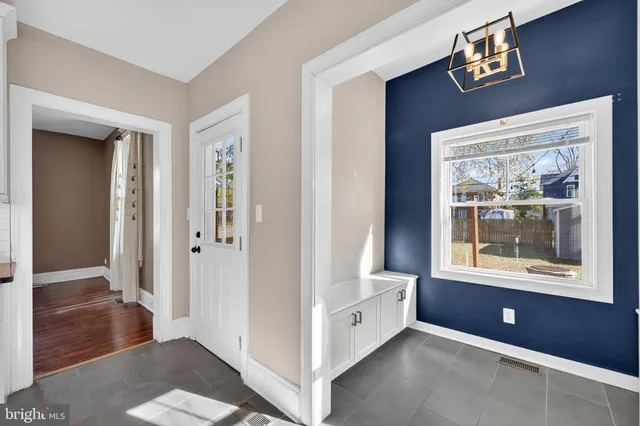 a view of an empty room and window