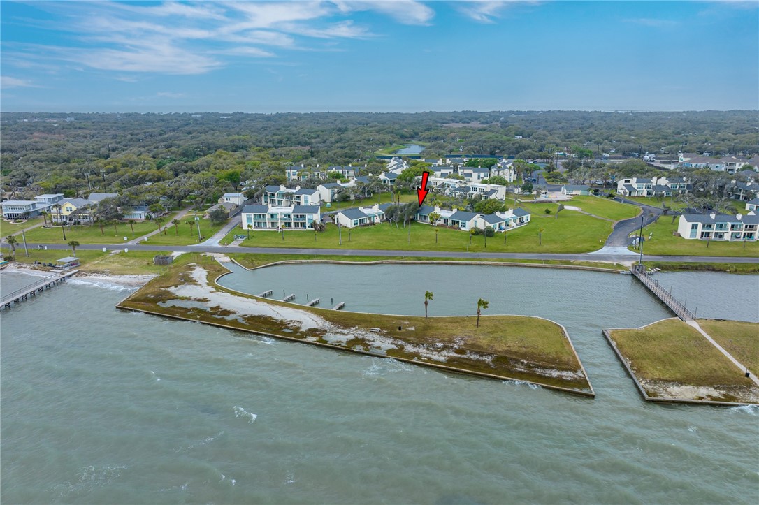 2003 North Fulton Beach Road, Unit 34 34 Rockport, TX 78382 - Photo 31 of 38 an aerial view of a house with a ocean view
