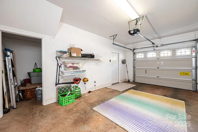 a front view of a house with parking space