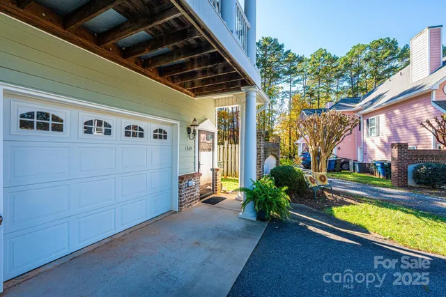 a view of a house with backyard and porch