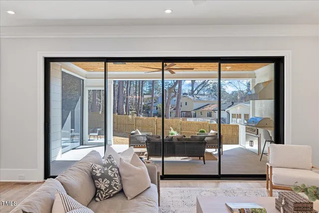 a living room with furniture and a rug