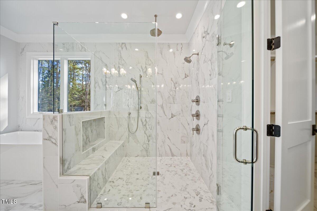 4906 Tremont Drive Raleigh, NC 27609 - Photo 51 of 71 a bathroom with a shower
