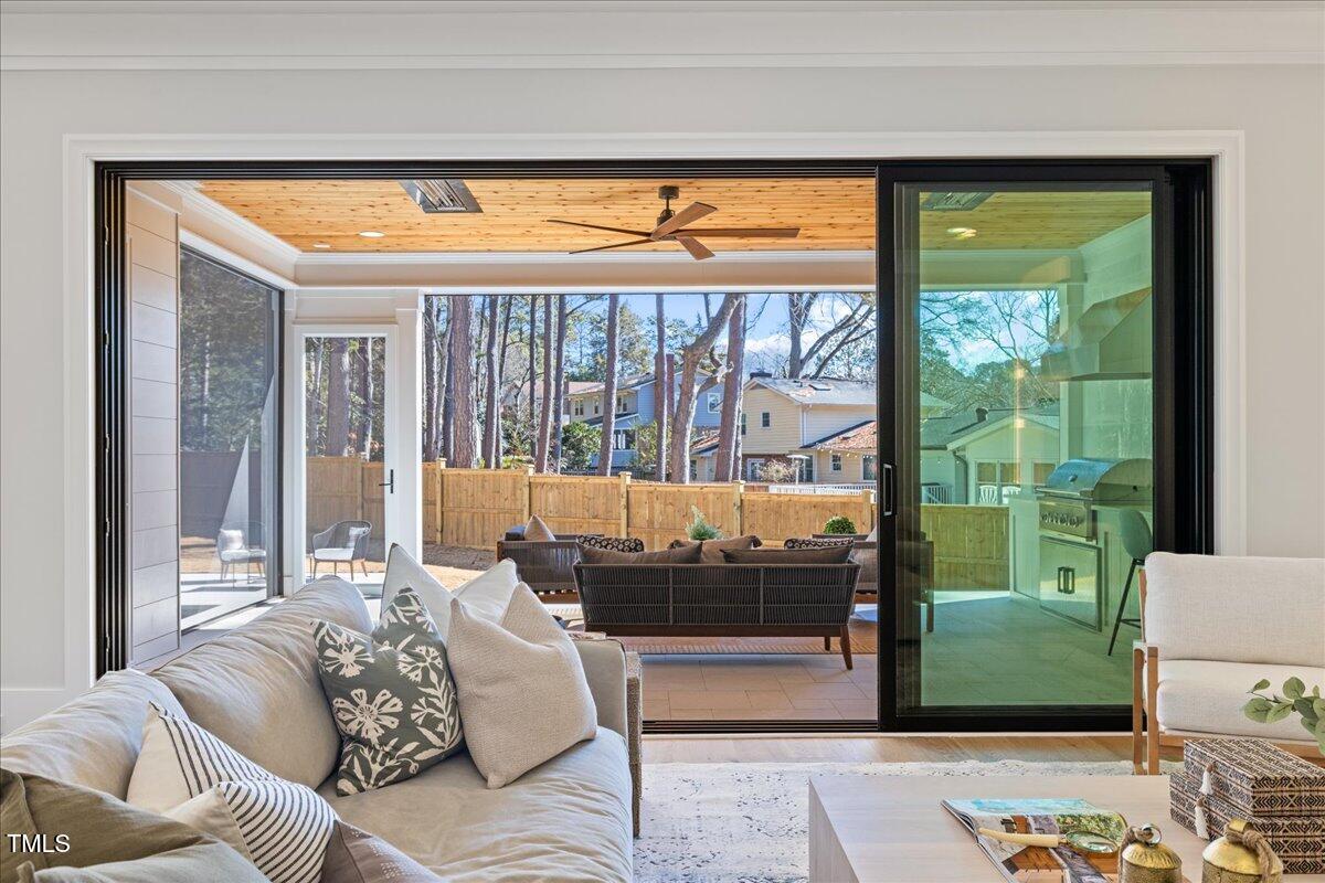 4906 Tremont Drive Raleigh, NC 27609 - Photo 61 of 71 a living room with furniture and a window