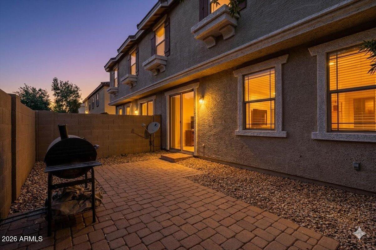1255 South Rialto, Unit 106 Mesa, AZ 85209 - Photo 26 of 32 a backyard of a house with table and chairs