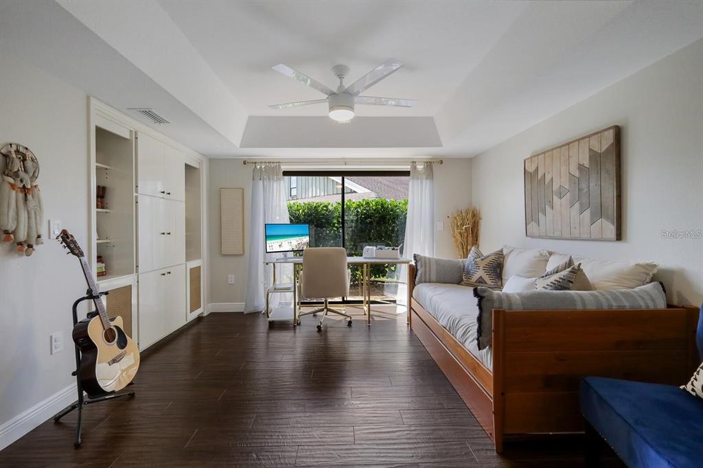 3705 Torrey Pines Boulevard Sarasota, FL 34238 - Photo 23 of 30 a living room with furniture and a large window