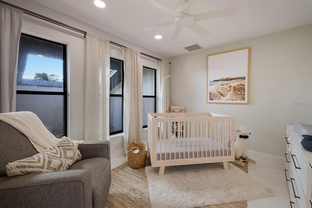 3705 Torrey Pines Boulevard Sarasota, FL 34238 - Photo 25 of 30 a living room with furniture and a window