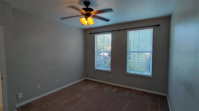 a bathroom with a sink a toilet and a shower