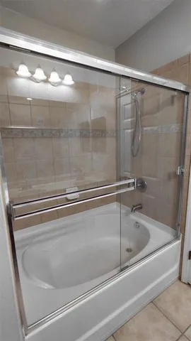 a bathroom with a sink vanity and mirror