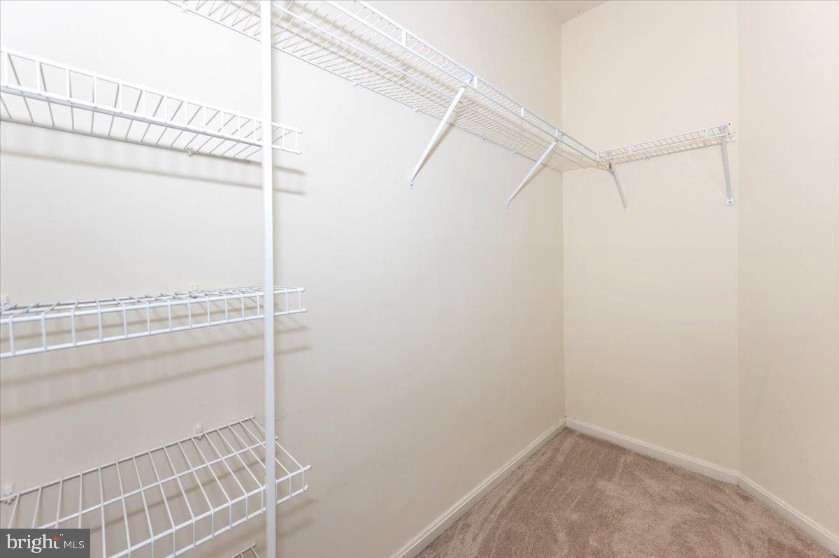 1683 Fallowfield Court Crofton, MD 21114 - Photo 16 of 28 a view of a room with racks on the wall