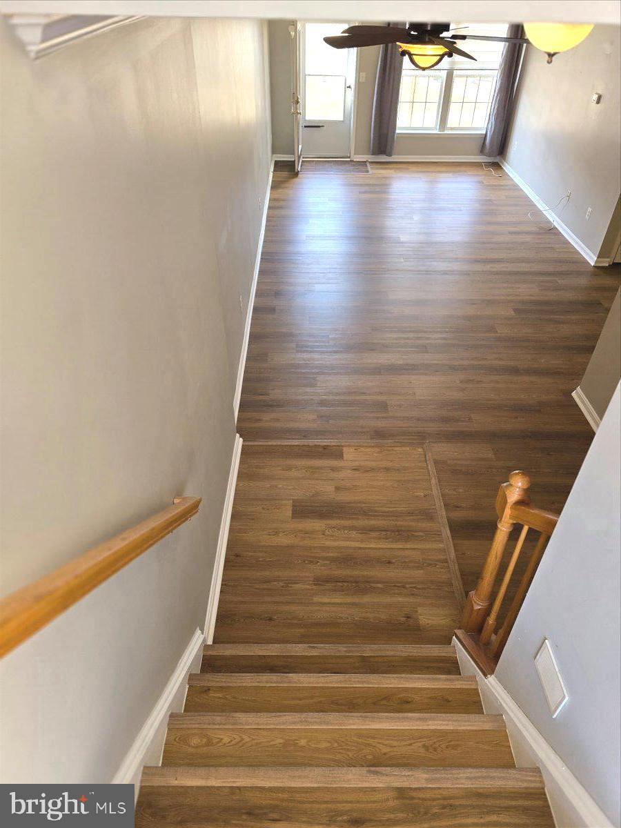 1683 Fallowfield Court Crofton, MD 21114 - Photo 8 of 28 a view of entryway and hall with wooden floor