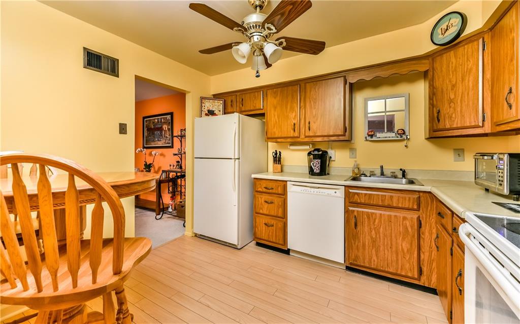 553 Sloop Road, Unit 28 Pittsburgh, PA 15237 - Photo 11 of 22 Kitchen has plenty of counter space and all white matching appliances.