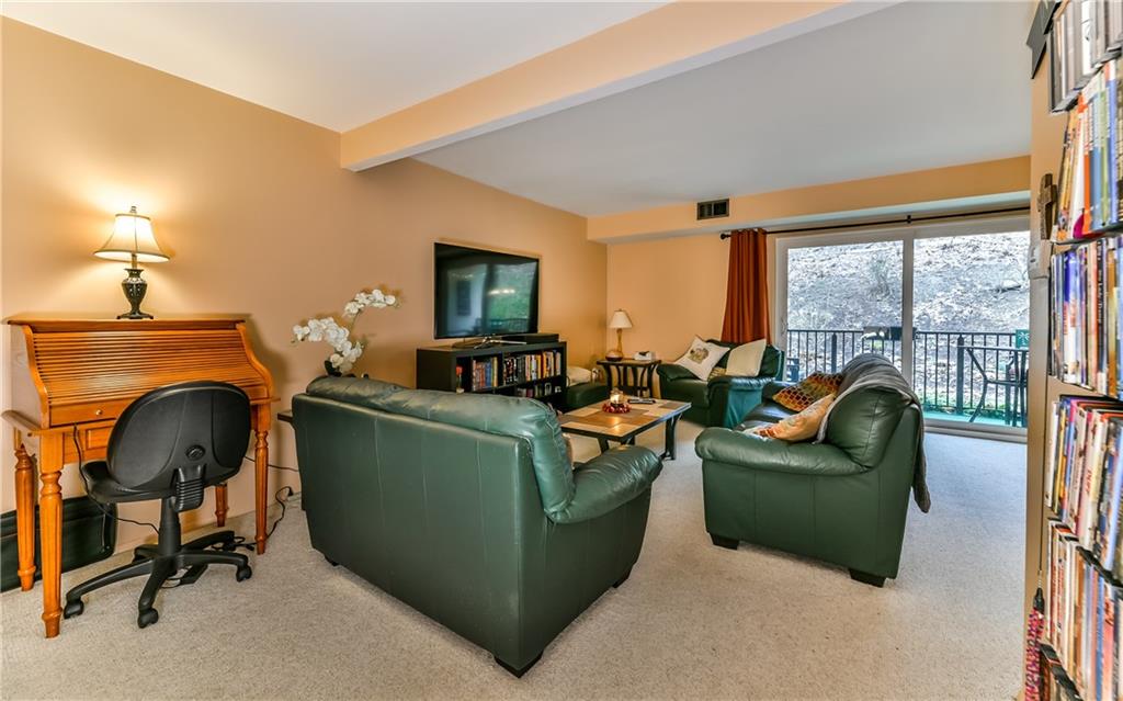 553 Sloop Road, Unit 28 Pittsburgh, PA 15237 - Photo 3 of 22 There is Ample living space in the living room with room for an office space, coach, love seat, chair, TV Stand and tables.