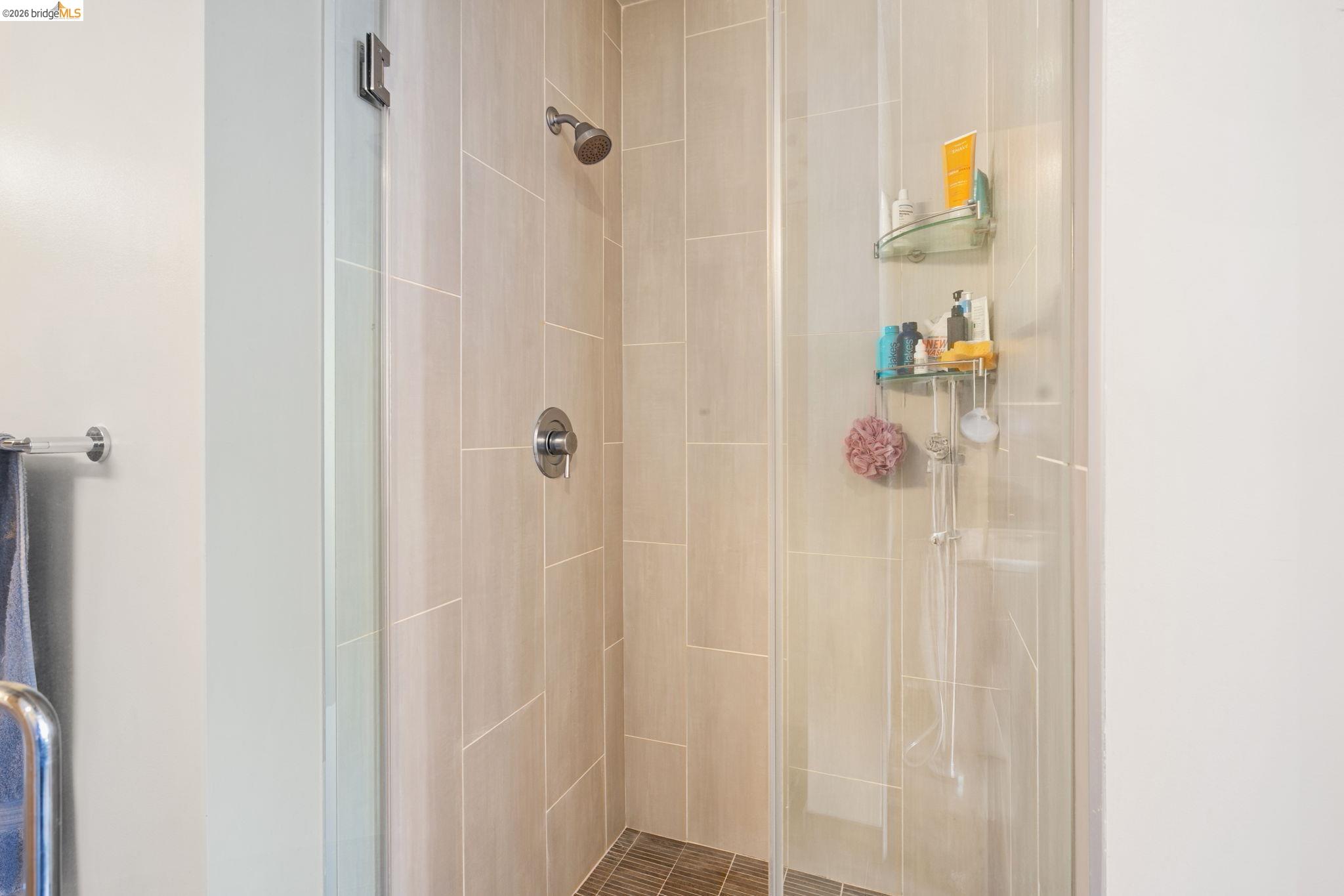 311 2nd Street, Unit 511 Oakland, CA 94607 - Photo 30 of 44 Full bath featuring a shower stall