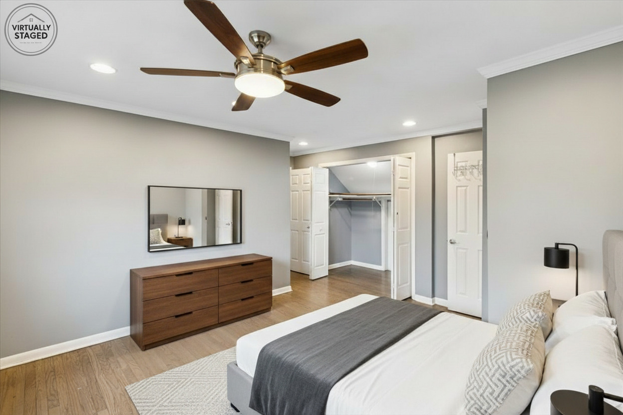 902 East Main Street Barrington, IL 60010 - Photo 12 of 33 a bedroom with a bed and a mirror