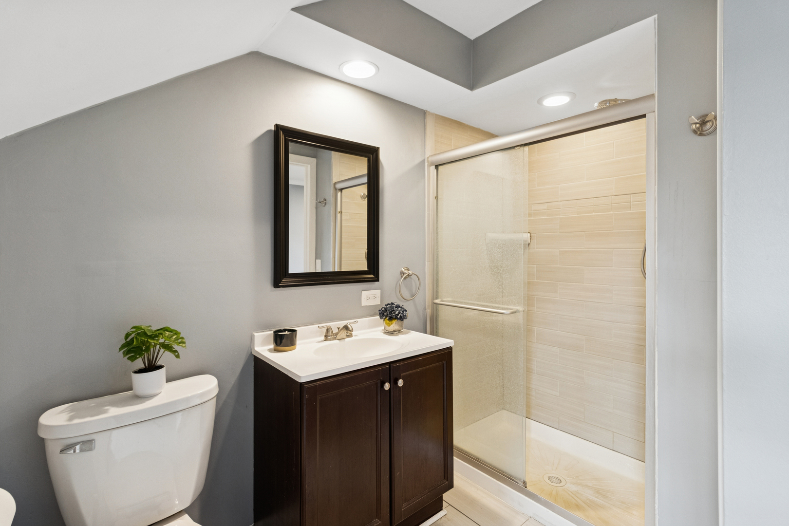902 East Main Street Barrington, IL 60010 - Photo 14 of 33 a bathroom with a sink a toilet and shower