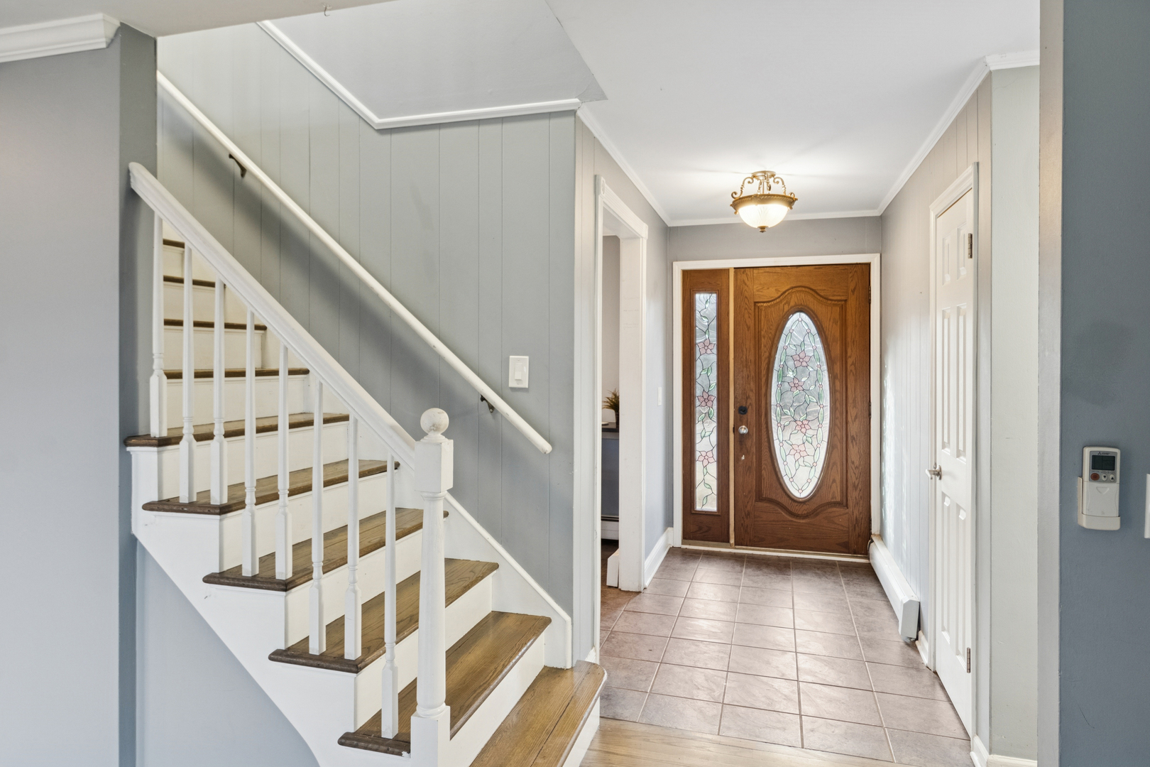 902 East Main Street Barrington, IL 60010 - Photo 2 of 33 a view of an entryway with wooden floor
