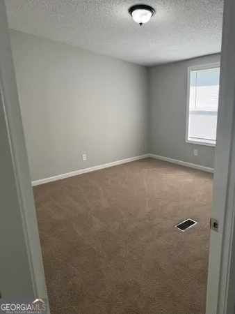 $117,000 | 405 Windsor Parkway, Unit 405W, Hampton, GA 30228
