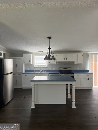 $117,000 | 405 Windsor Parkway, Unit 405W, Hampton, GA 30228