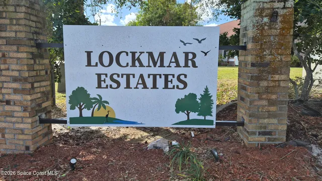 a sign broad on the side of the road