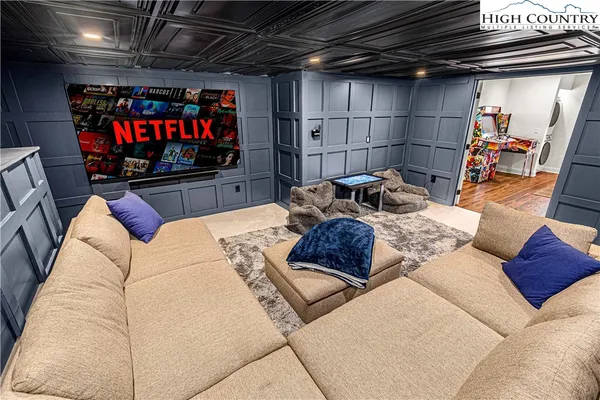 a living room with furniture and a couch