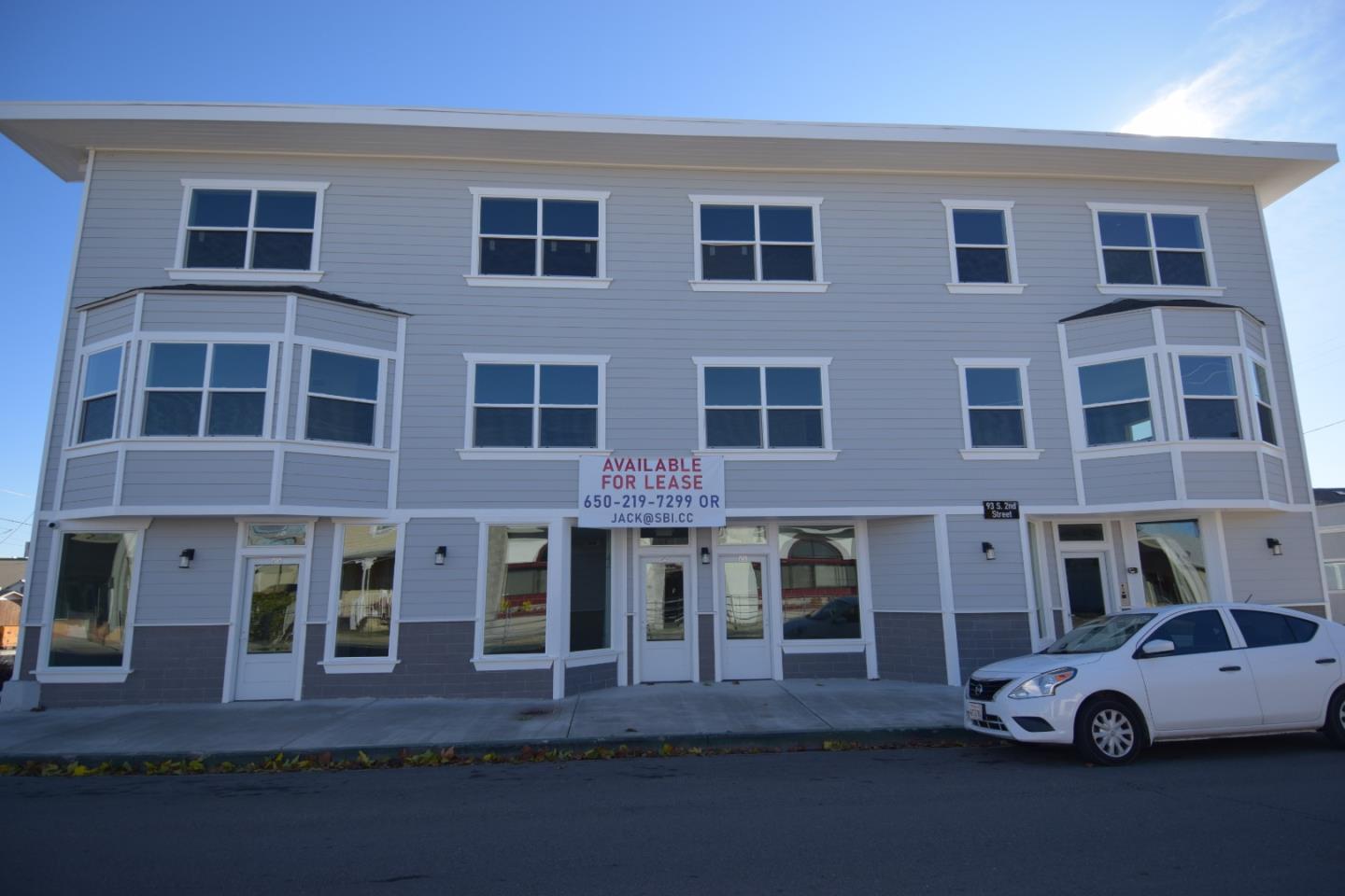 a car parked in front of a building