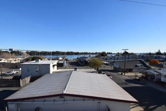 a terrace with a table and chairs