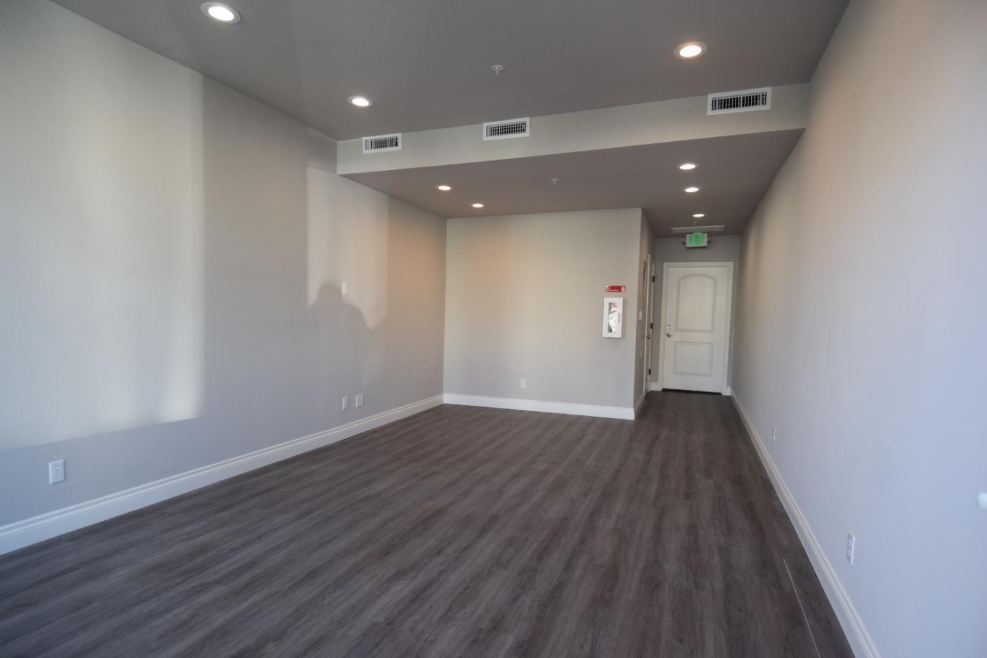 93 South 2nd Street Rio Vista, CA 94571 - Photo 23 of 25 a view of an empty room with wooden floor