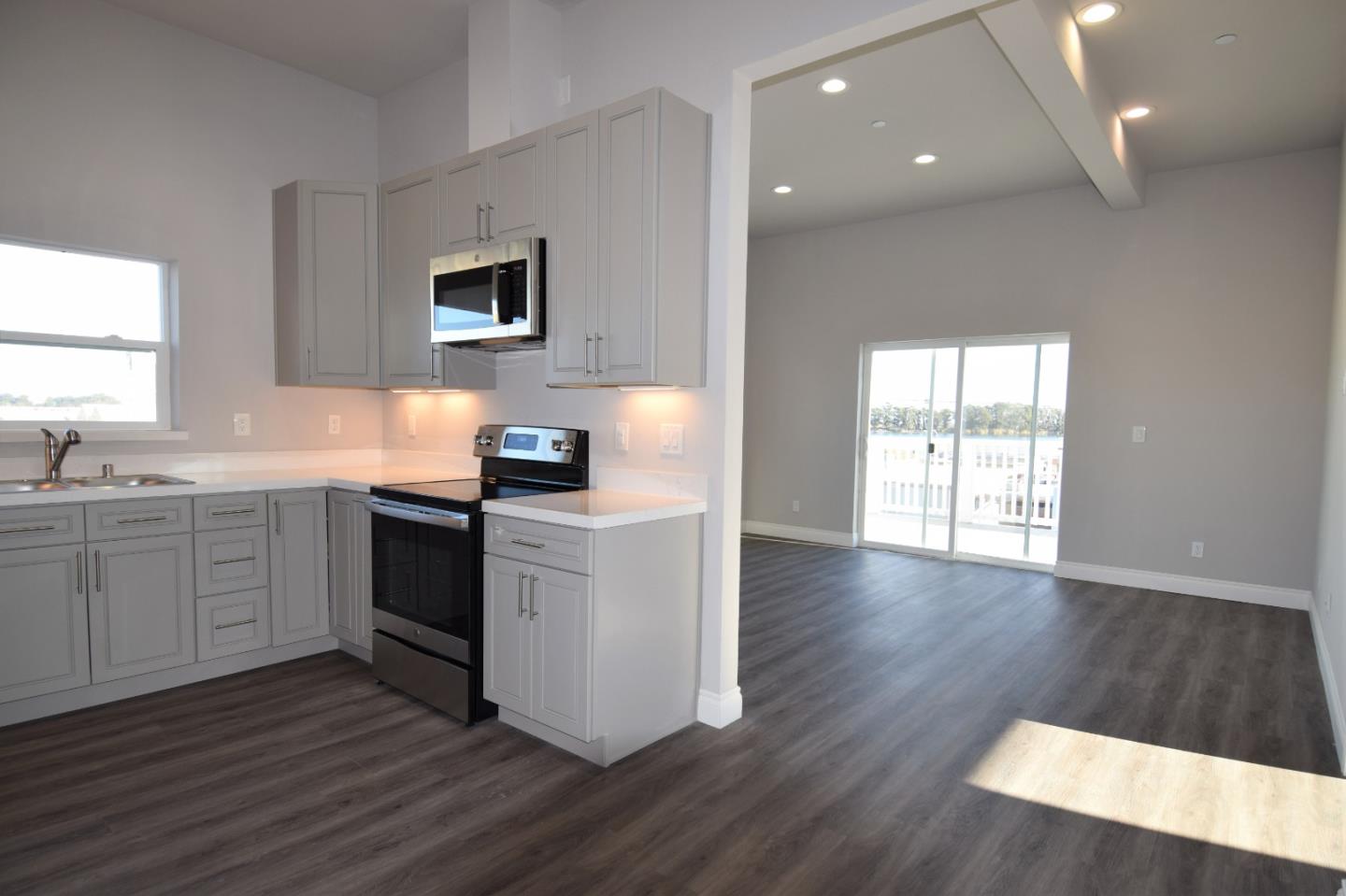 93 South 2nd Street Rio Vista, CA 94571 - Photo 8 of 25 a kitchen with a sink and a stove top oven