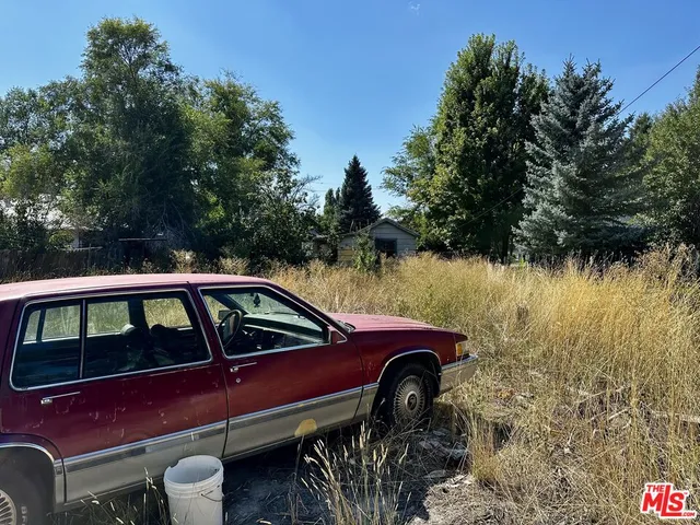 a view of a yard with a deck