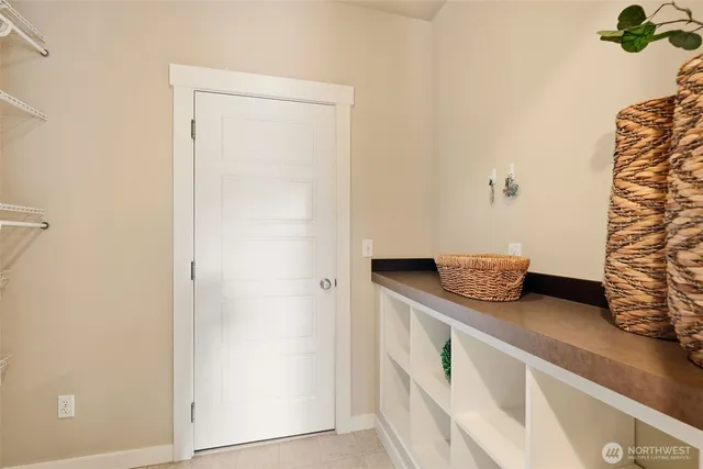 a view of kitchen island with stainless steel appliances