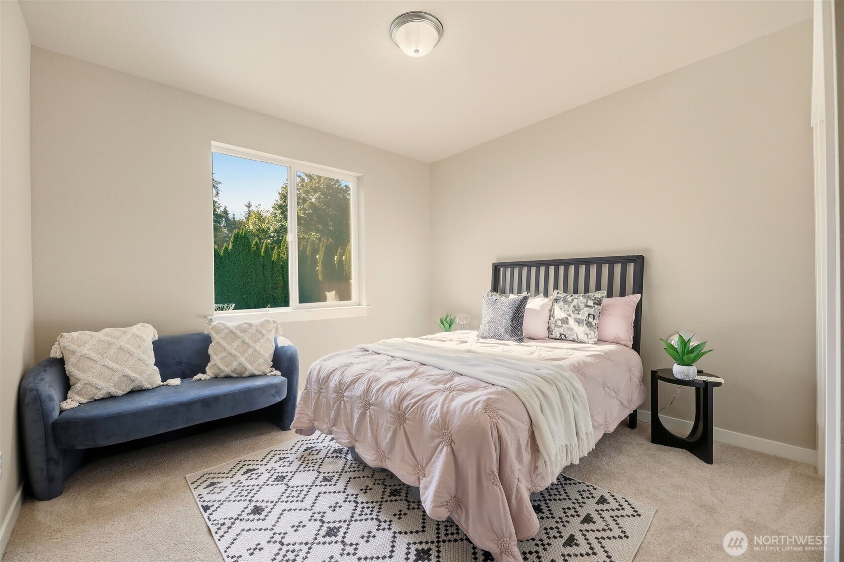 816 218th Street Southeast Bothell, WA 98021 - Photo 17 of 34 a bedroom with a bed and a couch