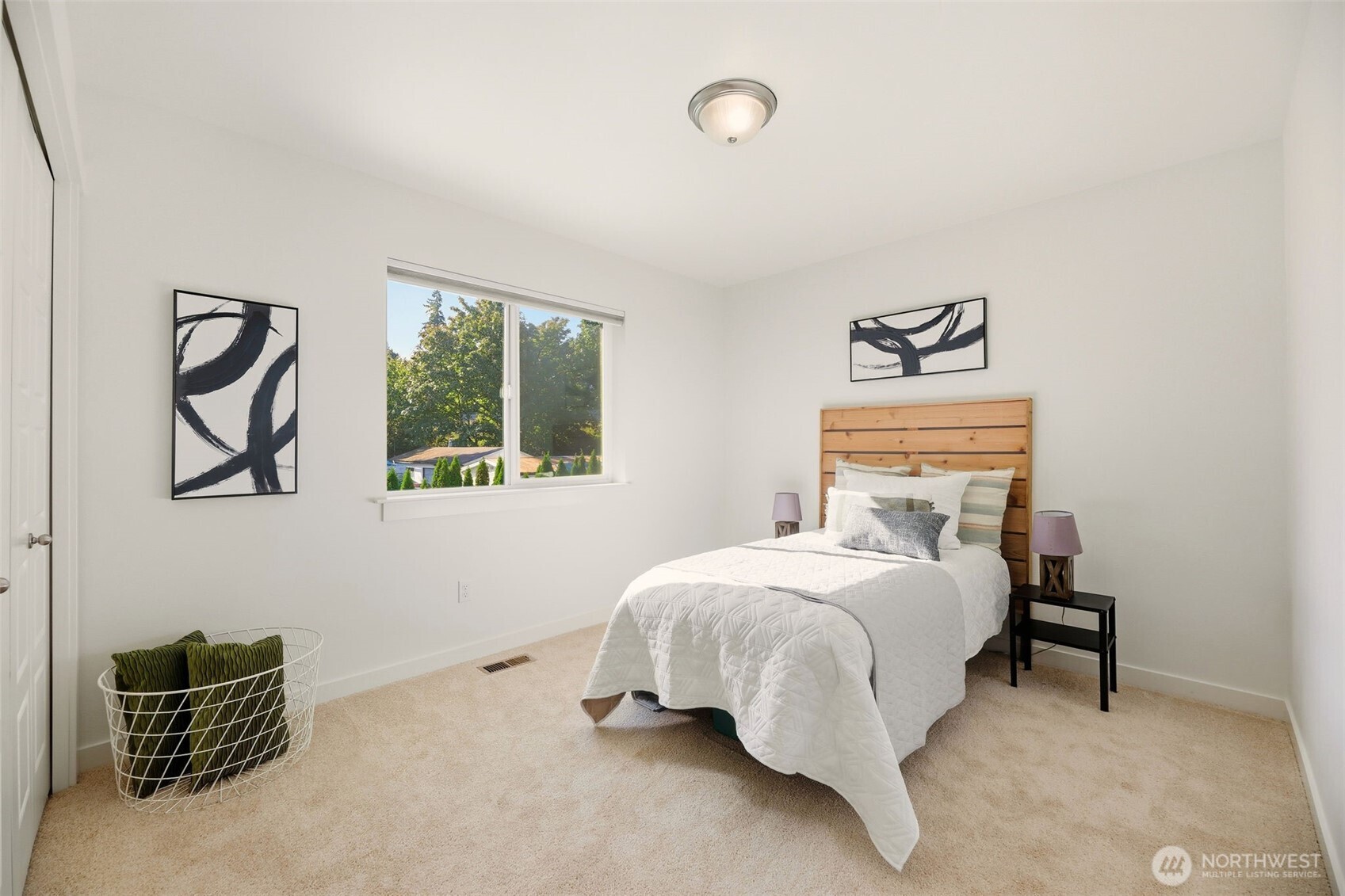 816 218th Street Southeast Bothell, WA 98021 - Photo 23 of 34 a bedroom with a bed and window