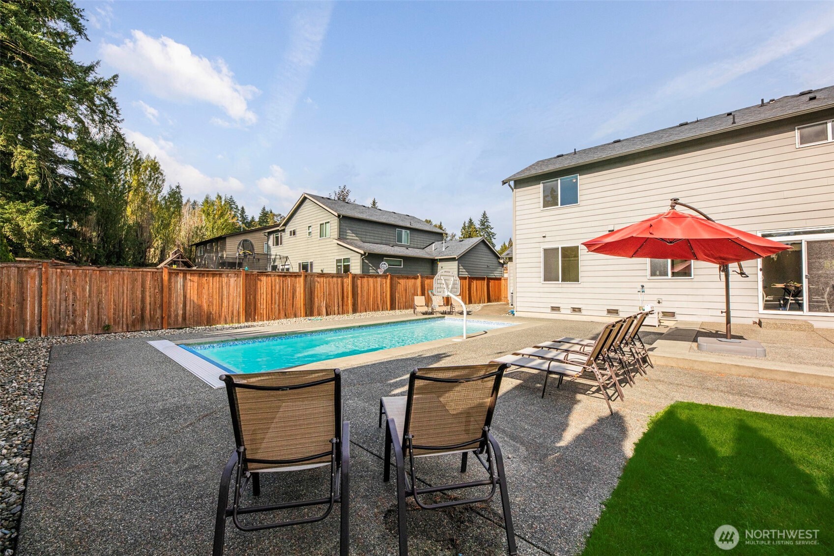 816 218th Street Southeast Bothell, WA 98021 - Photo 29 of 34 an outdoor space with furniture and umbrella