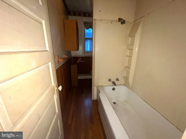 a bathroom with a bathtub