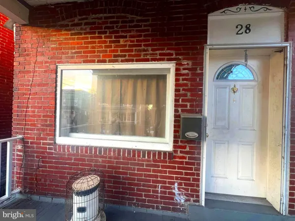 a front view of a house with a window
