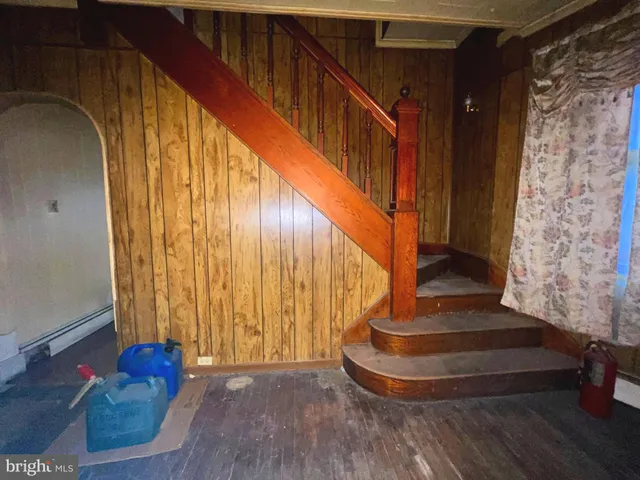 a view of a hallway with a livingroom