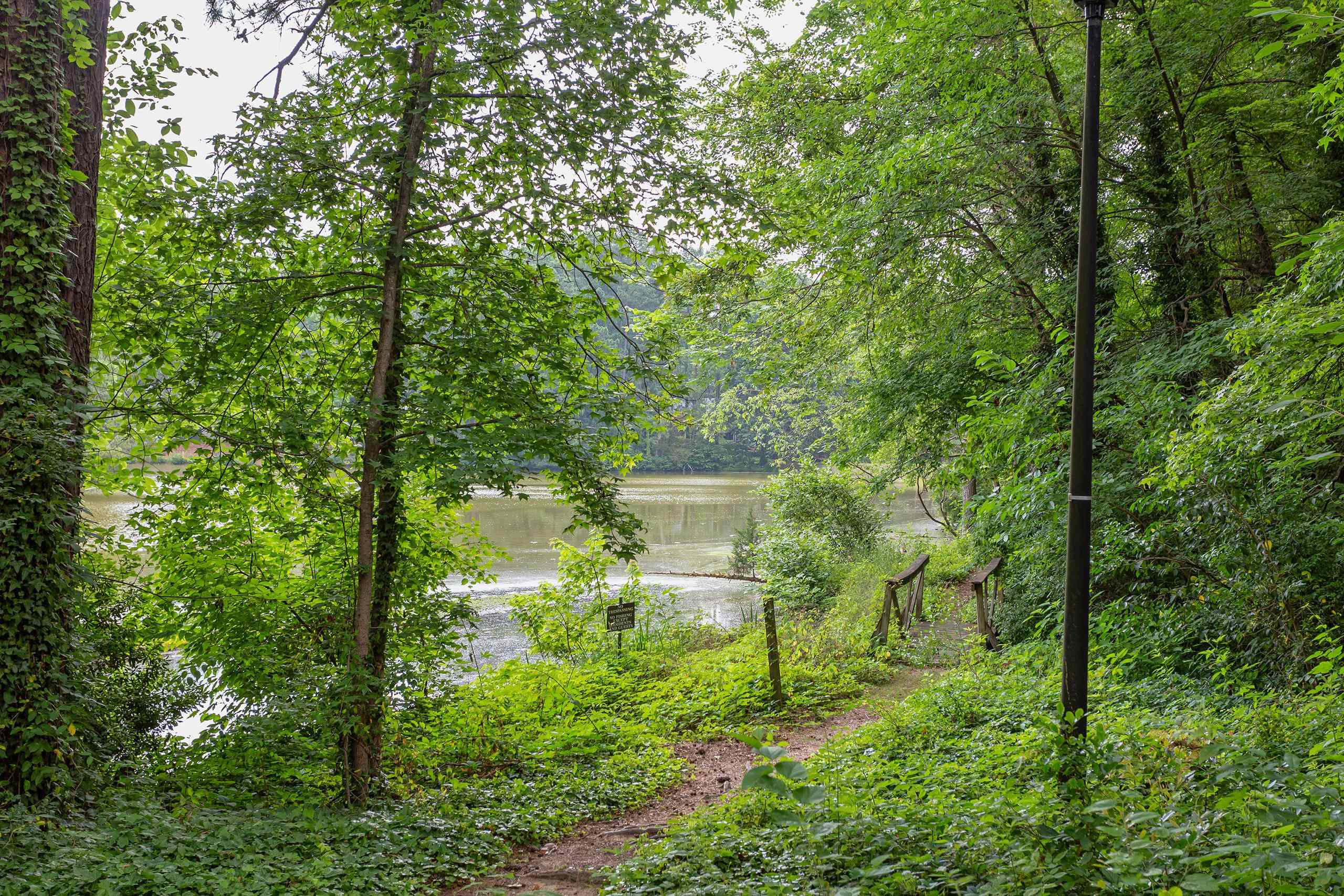 5060 Flint Ridge Place, Unit 5060 Raleigh, NC 27609 - Photo 27 of 29 Pond Behind Condo