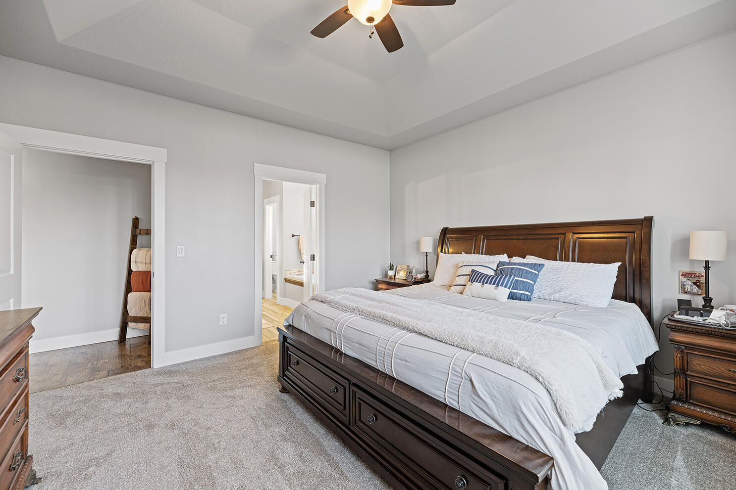 1043 Arrowhead Trail Eagle Point, OR 97524 - Photo 16 of 29 a bedroom with a bed and a ceiling fan