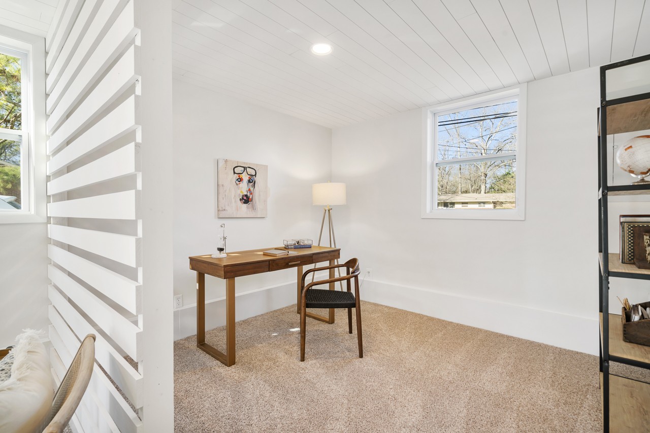 209 Stable Road Franklin, TN 37069 - Photo 23 of 25 a view of a workspace with furniture and a window
