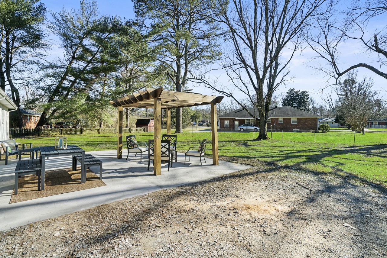 209 Stable Road Franklin, TN 37069 - Photo 24 of 25 a view of a house with backyard and sitting area