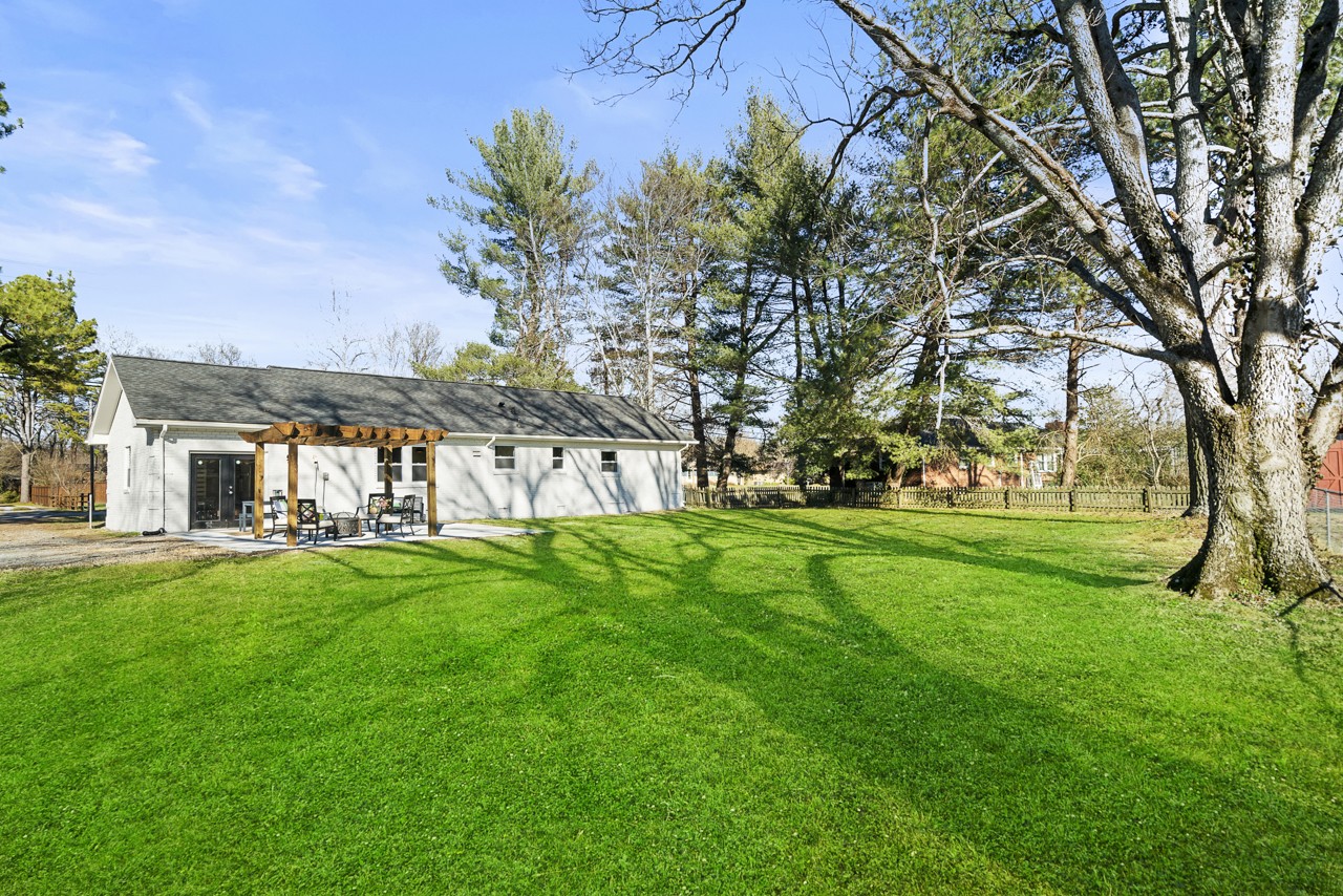 209 Stable Road Franklin, TN 37069 - Photo 25 of 25 a view of yard with swimming pool and green space