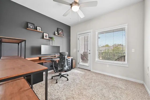 a workspace with furniture hardwood and a window